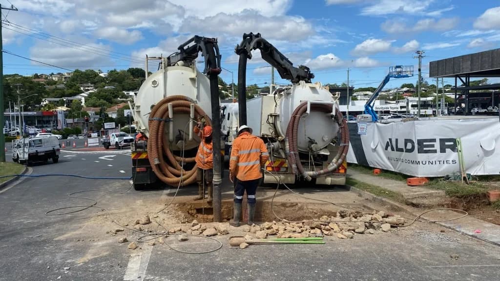 VACIT crews and vacuum trucks working together on an industrial site